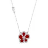 Collar de flor de dinero de la suerte de plata pura 999 para mujer, colgante de flor de ágata roja y diamante versátil de nicho, cadena para clavícula nueva 2026