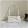 Bolso tipo baguette con lazo fresco y dulce, Bolso de hombro casual simple de moda elegante de nicho, Bolso de axila hermoso y elegante