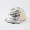 Al por mayor Otoño 2026 Lana Cálida Gorra de Pato para Bebé Estilo Coreano Serie a Cuadros para Niños y Niñas Sombrero de Ala Suave de Moda para Bebé