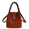 Bolso tipo cubo de diseño nicho nuevo de primavera, moderno, casual, único, bandolera cruzada de hombro de moda para mujer 2026