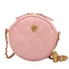 Bolso pequeño texturizado para mujer verano 2022 nueva moda este año popular nicho cadena de rombos bandolera pequeño bolso redondo al por mayor