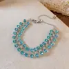 Azul Glaciar~ Pulsera Hueca con Cuentas de Cristal Transparente, Sensación de Lujo Ligero de Gama Alta, Accesorio de Mano Dulce Fresco y de Moda