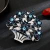 Nuevo diseño, estilo europeo, cesta de flores portátil de circonita completa, elegante, chic, exquisito temperamento, broche para abrigo, accesorios.
