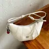 Bolsa de corrente versátil estilo dumpling, nova moda 2026, nicho feminino transfronteiriço, bolsa transversal e de ombro super popular