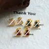 Brincos Casuais Retrô Elegantes de Concha com Zircônia Microcravejada Design de Luxo Acessível Brincos de Ponta Nicho