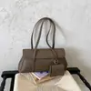 Bolsa de mão de alta qualidade com padrão de lichia para mulheres, nova bolsa tote retrô 2026, grande capacidade, versátil para o trabalho, bolsa de ombro e bolsa de antebraço