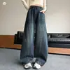 Pantalones Curvos de Mezclilla Vintage para Niñas 2026 Otoño Nuevo Estilo Niños Talla Mediana y Grande Etiqueta de Cuero Pantalones de Pierna Ancha Ropa Infantil Huzhou Zhili