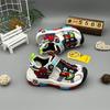 Zapatos de playa de punta cerrada para niños, sandalias de dibujos animados para niños, de moda, con suela suave y antipatadas, zapatos luminosos para niños.