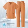 Conjunto de dos piezas de uniforme de enfermera de hospital dental modelo nuevo hecho a medida, unisex de manga corta y pantalón largo con cuello en V, ropa de trabajo
