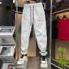 Pantalones Harem Negros de Moda Versátiles con Cintura de Cordón 2026 Nuevos Pantalones Deportivos Casuales de Secado Rápido para Hombre Simples y Transpirables