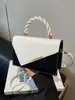 Bolso Cruzado Pequeño Cuadrado de Colorido Bloqueo de Color Texturizado de Moda Nuevo 2026 Contraste de Color Verano Casual Simple Elegante para Mujer