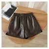 Pantalones cortos elásticos de cuero PU de cintura alta para mujer, otoño e invierno, talla grande, diseño favorecedor para figuras curvilíneas, línea A, negros, pierna ancha, se pueden usar como prenda exterior, bootcut
