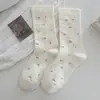 Calcetines florales de longitud media para mujer, otoño e invierno, estilo ins francés suave, calcetines holgados versátiles, calcetines largos de algodón estilo universitario