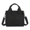 Bolso de lona de comercio exterior nuevo con gran capacidad y múltiples compartimentos, bolso de mano cruzado versátil y casual para el día a día y bolso de hombro para mujer