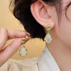 Aguja de plata 925, diseño de nicho, aretes de puesto de mercado nocturno, fuente mayorista, aretes de moda estilo coreano, aretes populares