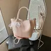 Bolso pequeño de mano simple y elegante para mujer, nuevo artículo de verano 2026, bolso tipo cubo, moderno, color liso, texturizado, bolso cruzado para mujer
