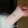 Pulsera Corazón de Zirconia de Colores Electrochapada en Oro Real de 14K, Pulsera de Lujo Ligero de Gama Alta, Joyería Nicho Súper Brillante Estilo Coreano para Mujeres