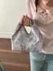 Bolso de Mano Cubo Casual Simple de Nicho Coreano para Mujer Primavera 2026 Nuevo Bolso de Mano de Textura de Alta Calidad