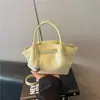 2026 Nuevo Diseño Coreano de Nicho Moda para el Trabajo Diseño de Bolso Cubo de Mano Bolso de Mujer Bolso de Hombro Único Bolso Cruzado