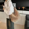 2026 nova bolsa de palha grande, minimalista, vazada, moderna, tecida à mão, com alça de ombro casual