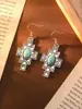 Brincos estilo étnico boêmio com explosões transfronteiriças europeias e americanas com diamantes e brincos ocos turquesas Brincos femininos retrô para todos os gostos
