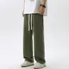 Pantalones casuales de color liso estilo japonés para hombre, pantalones rectos holgados para primavera y otoño, pantalones cargo de pierna ancha fluidos versátiles con cintura elástica