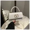 Bolso Nuevo Otoño e Invierno 2024 Moda Femenina Versátil Simple Letra Tendencia Diseño de Nicho Bolso de Hombro Cruzado