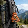 Nuevo producto transfronterizo Peluche Protect Punch heMonkey orangután colgante acrílico