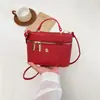 Nova bolsa de caixa trançada de verão e outono, bolsa de mão de nicho, bolsa transversal simples para o dia a dia, bolsa de ombro feminina
