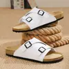 Zapatos Birkenstock para mujer 2026 nuevo verano doble hebilla una correa chanclas suela de corcho antideslizantes sandalias de exterior zapatos de hombre sin cordones