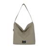 Bolso bandolera casual de lona estilo japonés para mujer 2025 Nuevo Bolso de hombro simple de gran capacidad Diseño de nicho Bolso para ir al trabajo