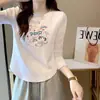 Camiseta de algodón acanalado de manga larga para mujer, nuevo estilo primavera/otoño, corte ajustado, diseño único, dobladillo curvo irregular, top de moda
