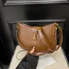 Bolso de hombro de moda 2025 para mujer, estilo coreano, sencillo, de color sólido, con textura de alta calidad y bandolera de nicho.