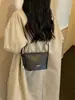 Bolso tipo cubo de alta gama para mujer, moderno y sencillo, popular este año, versátil, elegante y exquisito, adecuado para ir al trabajo y como bolso cruzado