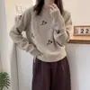Nuevo suéter de punto floral de otoño e invierno para mujer, tejido suelto de manga larga, suéter jacquard suave para usar como prenda exterior