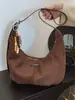 Bolsa Transfronteiriça de Camurça Feminina Grande Capacidade Nova Outono e Inverno 2025 Bolsa Transversal Fosca Retrô Bolsa Dumpling para o Trabalho