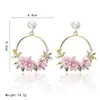 Aretes de Flor Estilo Coreano de Moda Mismo Estilo Ins para Mujer Dulces Aretes de Perla de Cerámica Blanda Aretes de Flor para Mujer Estilo Caliente