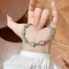 Pulsera de Calavera de Calabaza Súper Brillante, Moderna y Colorida con Pedrería para Mujer, Estilo Dulce con un Toque de Lujo, Accesorio de Muñeca Simple, Versátil y Dopamina