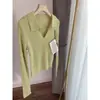 Processamento OEM 100% fio Yangzi alemão suéter de malha de cor sólida minimalista com gola polo de meio botão slim fit versátil para mulheres