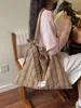 Bolso de mano de cuadros de moda 2026 nuevo modelo gran capacidad versátil bolso de mano para ir al trabajo bolso de lona bolsa de compras transfronterizo