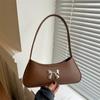 Bolsa pequena de axila de alta qualidade para mulheres 2024 Nova moda Bolsa de ombro para todos os gostos Design de nicho Bolsa de mão baguete da moda