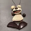 Encantador perrito peludo con la lengua fuera, llavero para bolso, colgante de dibujos animados natural, semillas de terapia de sonido curativas, popular en zonas escénicas, amuleto divertido y adorable