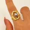 Anel Aberto de Bola de Aço Dourado e Prateado de Aço Inoxidável Europeu e Americano com Combinação de Cores Anel Assimétrico Personalizado com Formato Especial Joias Transfronteiriças para Mulheres