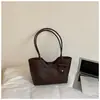 Bolsa de palha tecida da moda para mulheres, versão coreana de verão de 2026, elegante e texturizada, bolsa de ombro e de axila casual de grande capacidade