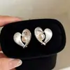 Elegante HerederaEstilo Fresco Bolso de Lunares Plateados Arete Arete Único Mujer 2026 Aretes Súper Hermosos