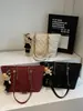 Bolsa de Tote Pequeña con Fragancia Estilo Francés 2026 Popular Bolso de Hombro Acolchado con Cadena Bolso Cruzado de Hombro Único Retro para Mujeres