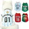 Ropa nueva para mascotas transfronteriza Copa del Mundo manga corta copa de fútbol perros perros pequeños medianos grandes gatos ropa estilo primavera verano