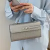 Bolso de Alta Gama para Mujer 2026 Nueva Moda Patrón Tejido Bolso Kelly Nicho Lujo Ligero Bolso de Hombro Cruzado