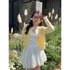 Suéter cárdigan amarillo para mujer, nuevo estilo otoño e invierno 2026, aspecto de alta gama, combinado con una chaqueta tipo camisola, top de punto de primavera