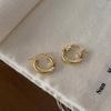 Pendientes redondos brillantes retro franceses de alta calidad, diseño de nicho europeo y americano, estilo minimalista de metal, chapados en cobre y oro real.